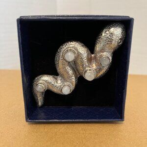 Tibetan silver and moonstone snake pendant.